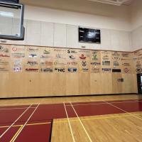 Alberni Athletic Hall vinyl sponsor logos placed on wall